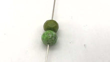 Load and play video in Gallery viewer, Natural Gaspeite Faceted Roundel Beads | 7x5mm to 7x3mm Green| Roundel | 2 Bds|
