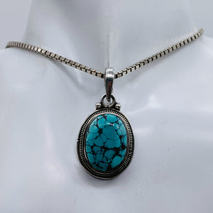 Turquoise Sterling Silver Native Oval Pendant | 1 3/4" Long | Blue/Black | 1 |