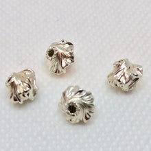 Load image into Gallery viewer, Designer 4 Silver Twisted Roundel 7.5mm Beads 7858 - PremiumBead Alternate Image 2
