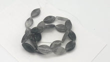 Load and play video in Gallery viewer, Misty Grey Tourmalated Quartz Bead Strand | 20mm | Grey | Flat Oval | 21 Beads |
