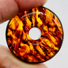 Load image into Gallery viewer, Amber 7mm Center Hole Donut Pendant Bead | 2 1/4x7/8&quot; | Red | 1 each |
