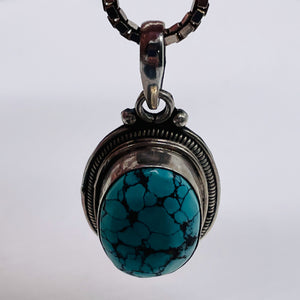 Turquoise Sterling Silver Native Oval Pendant | 1 3/4" Long | Blue/Black | 1 |