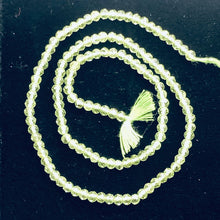 Load image into Gallery viewer, Peridot Faceted Roundel 13&quot; Bead Strand | 4 mm | Green | 130 Beads | 13&quot; |
