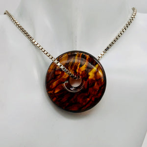 Amber 7mm Center Hole Donut Pendant Bead | 2 1/4x7/8" | Red | 1 each |