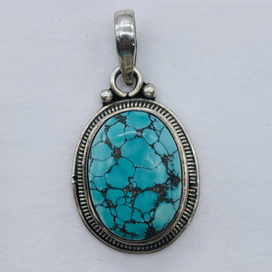Turquoise Sterling Silver Native Oval Pendant | 1 3/4" Long | Blue/Black | 1 |