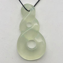 Load image into Gallery viewer, Hand Carved Translucent Serpentine Infinity Pendant with Black Cord 10821W | 45.5x24x6mm | Light Green - PremiumBead Primary Image 1
