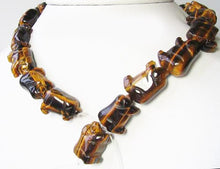 Load image into Gallery viewer, Piggies Hand Carved Tigereye Pig Bead Strand | 25x19x12mm | Golden Brown - PremiumBead Alternate Image 3
