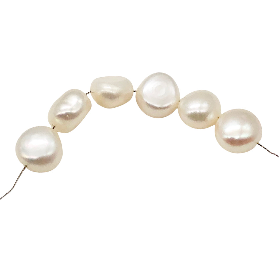Huge 10 to 9mm Creamy White Button FW Pearls 004500
