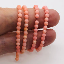 Load image into Gallery viewer, Coral Faceted Strand Round | 3 mm | Salmon | 112 Beads |
