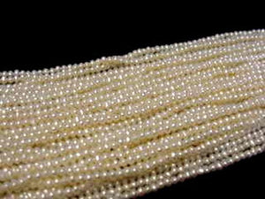 Creamy 3x2.5 to 3.5x3mm Seed Pearl Strand 102278 - PremiumBead Primary Image 1