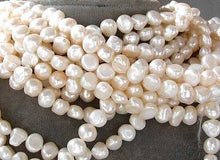 Load image into Gallery viewer, Lovely Baroque Creamy White FW Pearl Strand 106662 - PremiumBead Alternate Image 2
