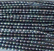 Load image into Gallery viewer, Perfect 6.5x5.5-6x5mm Peacock Oval FW Pearl Strand 104509 - PremiumBead Alternate Image 2
