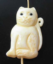 Load image into Gallery viewer, Sophisticated Carved 29mm Sitting Kitty Cat Waterbuffalo Bone Bead 010622 | 29x19x9.5mm | Cream and Black - PremiumBead Primary Image 1
