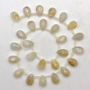 Shine! Natural Faceted Rutilated Quartz Briolette Bead Strand - PremiumBead Primary Image 1