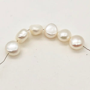Huge 10 to 9mm Creamy White Button FW Pearls 004500